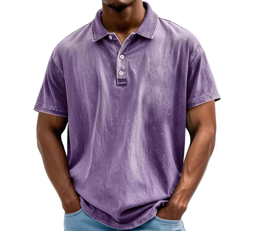 Purple washed polo shirt with three-button placket and short sleeves, front view on model