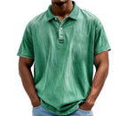 Close-up of washed polo collar and button placket showing fabric texture and stitching detail