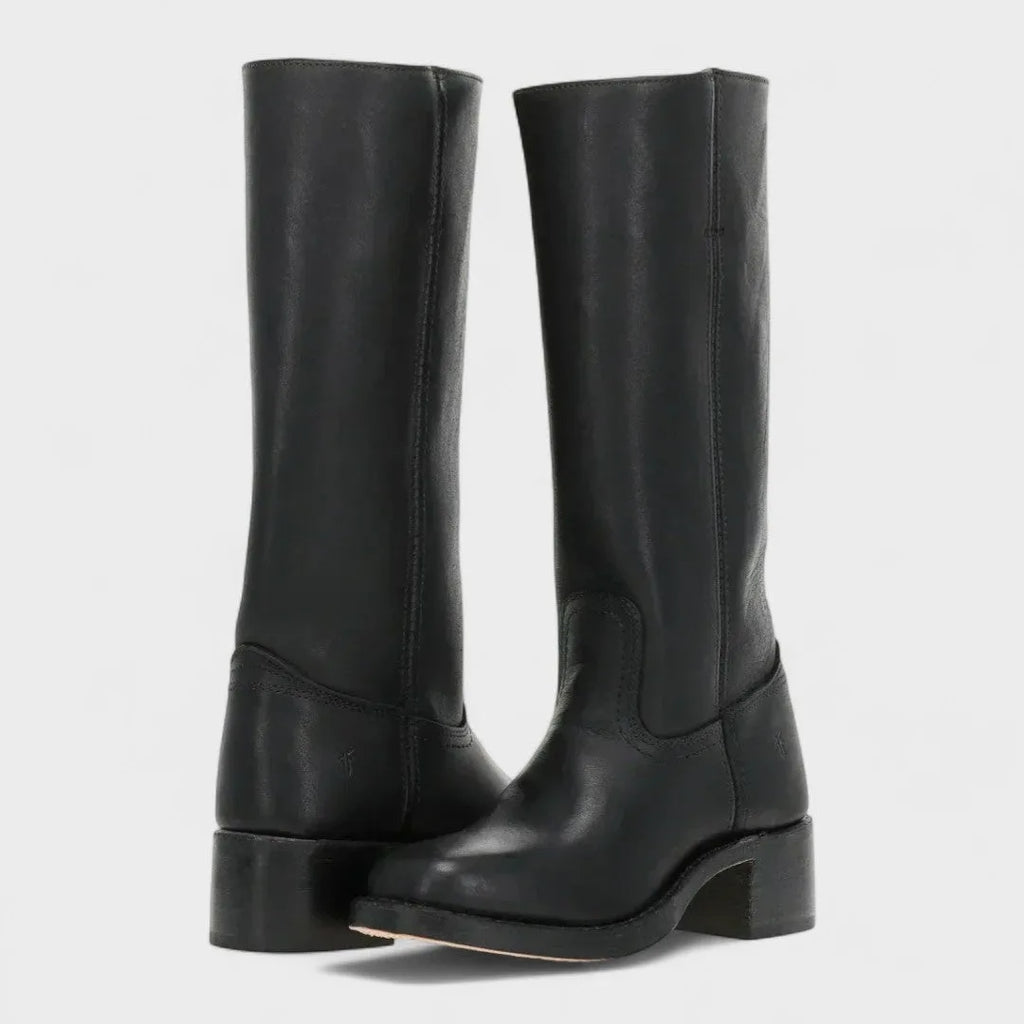 Front pair of knee-high black leather boots with pull-on tab and round toe silhouette