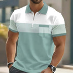 Man modelling a sage green and white striped zip-up polo shirt with short sleeves and front pocket